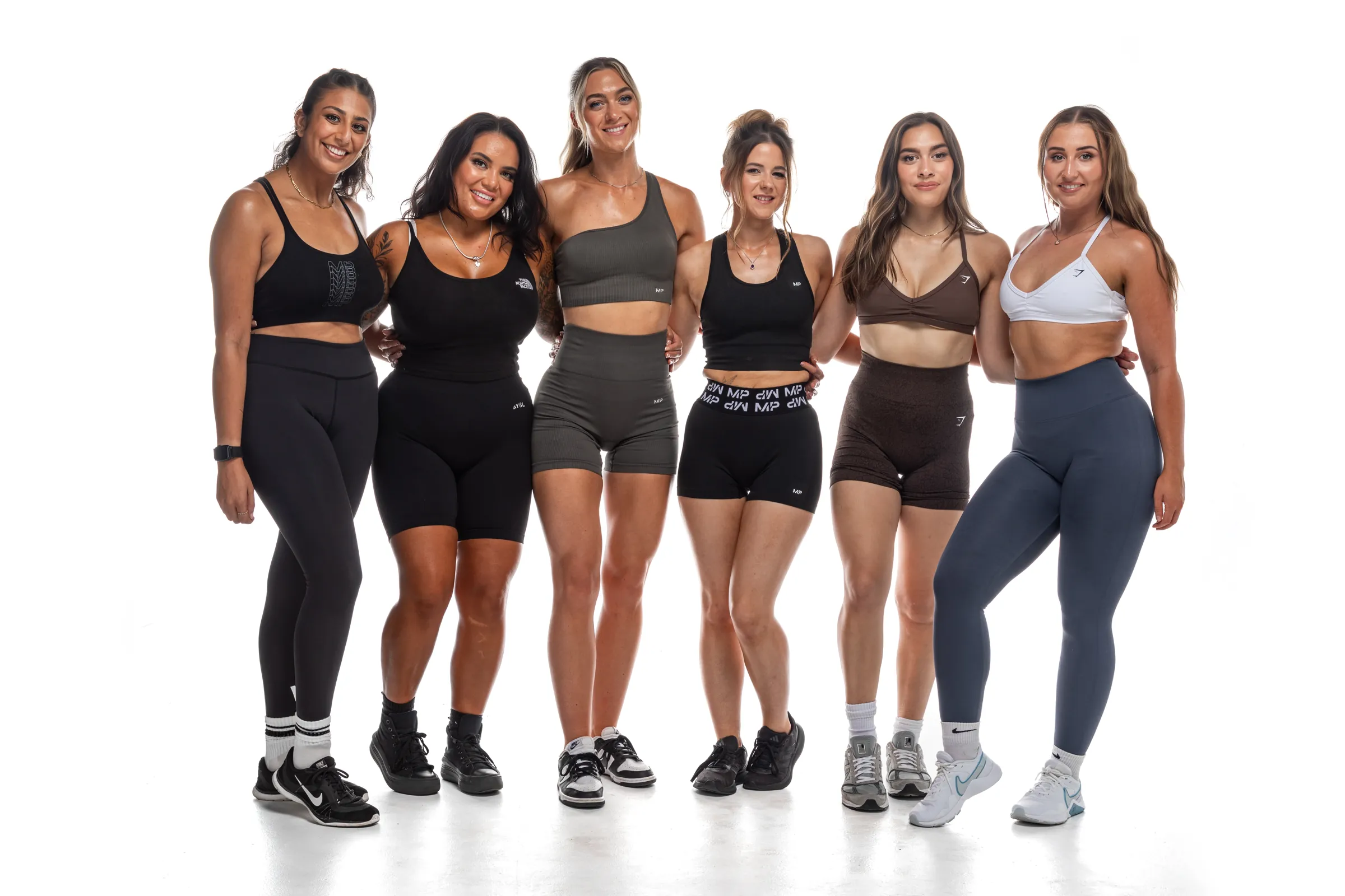 Lara's client group standing together in their Lara W Fitness training kit