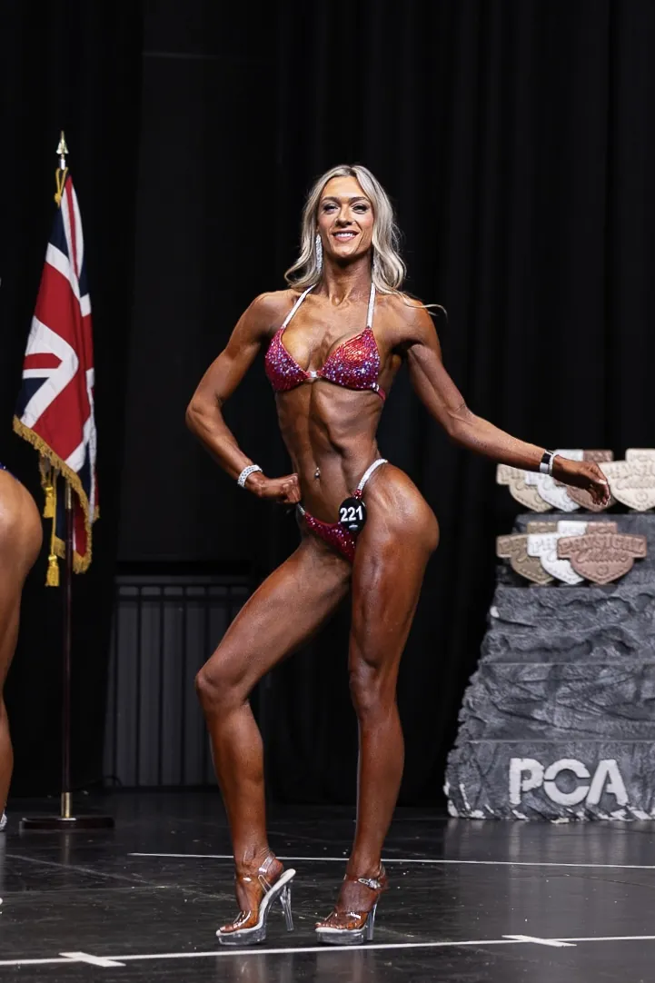 Lara mid-routine on the PCA stage in 2025
